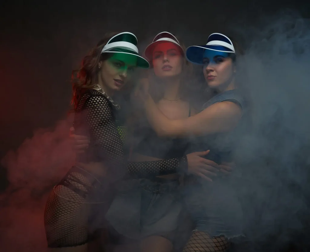 Three entertainers in visors posing in stage fog, Controversy Pittsburgh promo